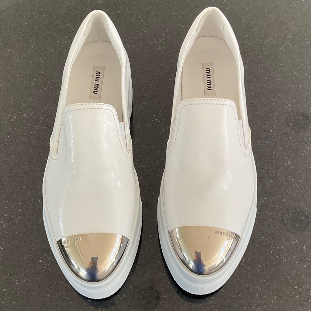 Miu Miu White Patent Leather Slip-On Sneakers with Silver Toe Caps